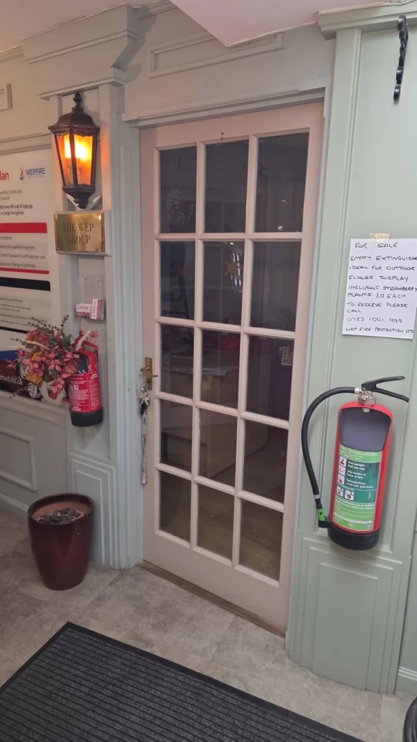 Our Crediton office has had a makeover. Recycled fire extinguisher planters are